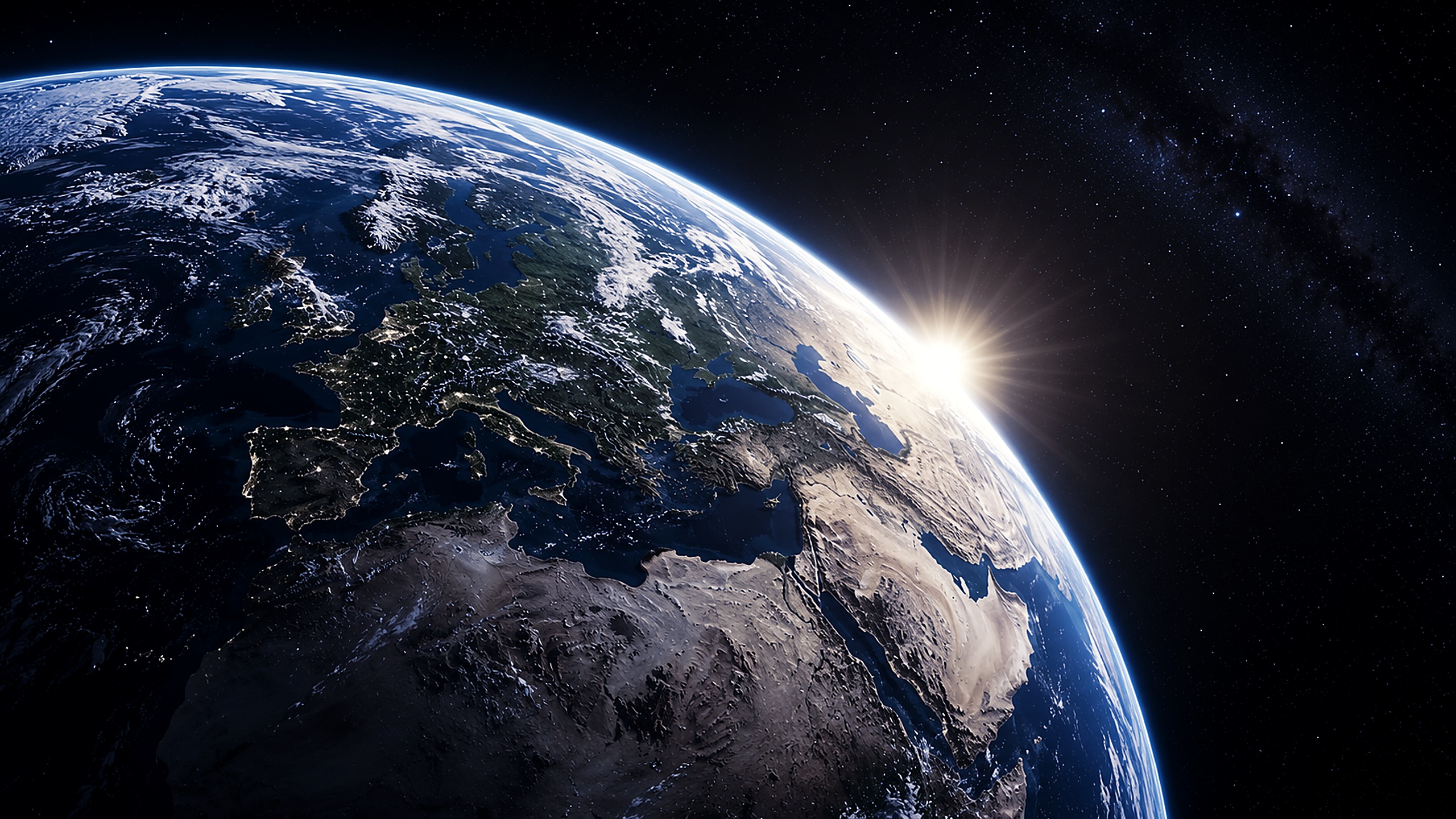 Earth from orbit at sunrise, Europe and North Africa below